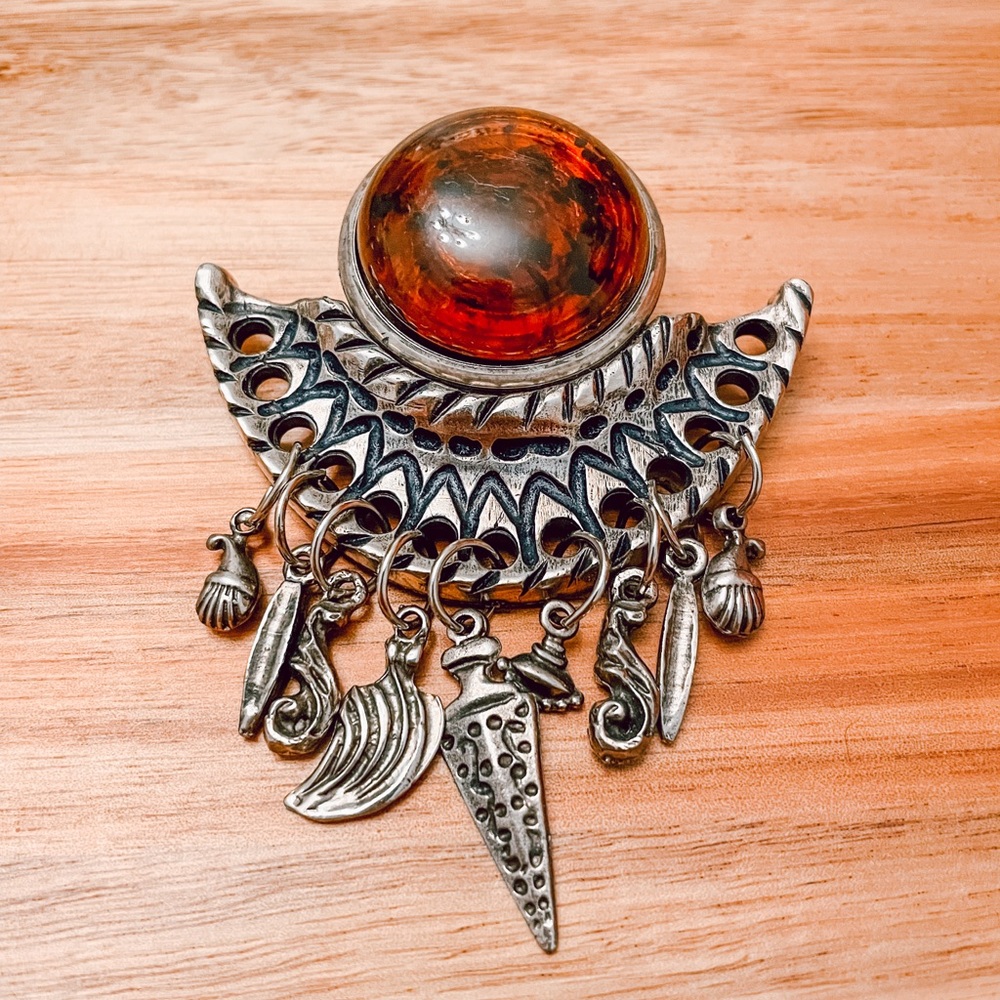 DX stamped brooch